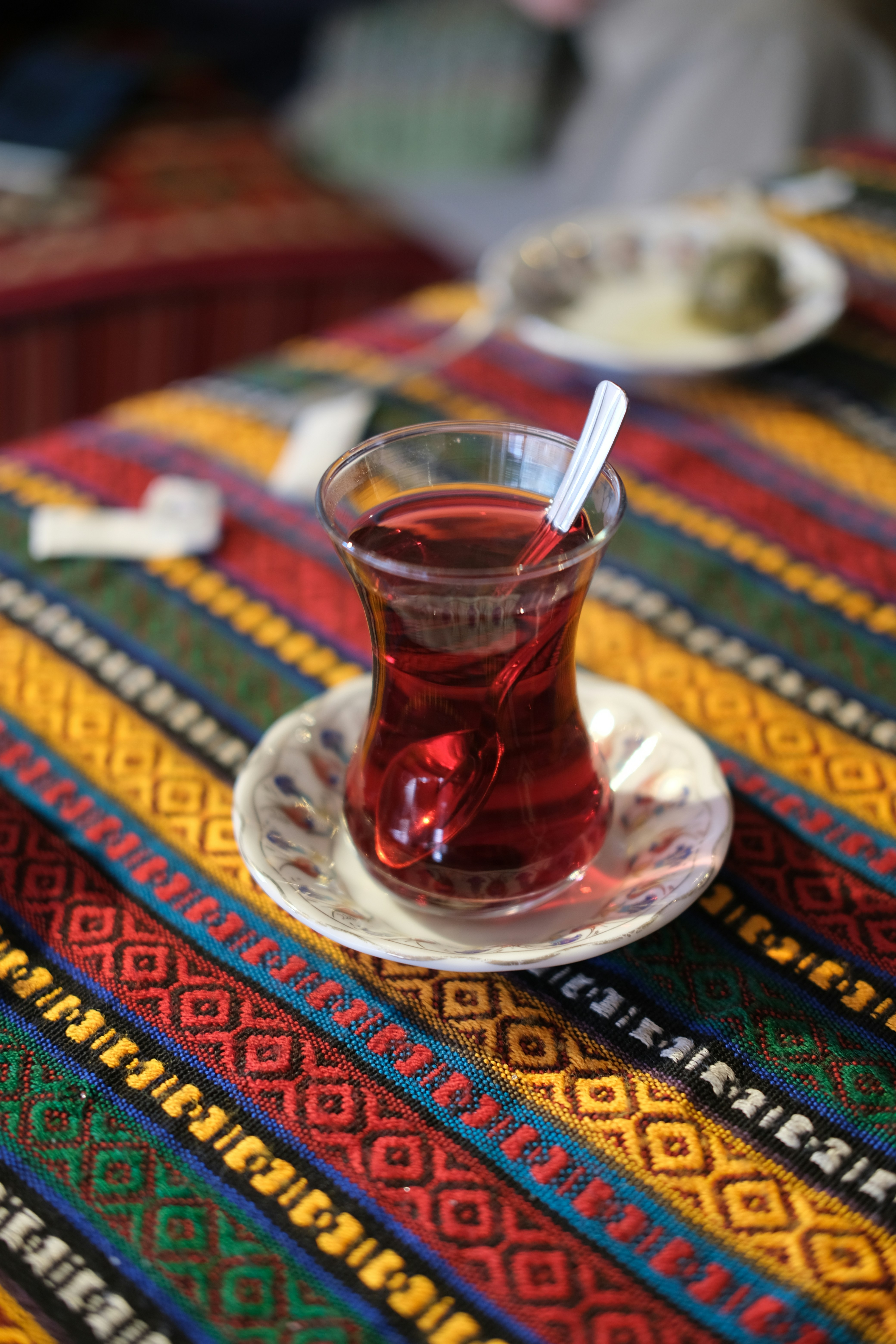 A glass of black Kurdish tea